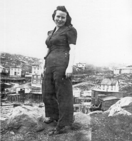 543: Mollie McCarthy in front of Red Island harbour. (circa early 1940s) [courtesy of Mollie McCarthy]  - Daughter of James McCarthy &amp;amp; Julia Reddy